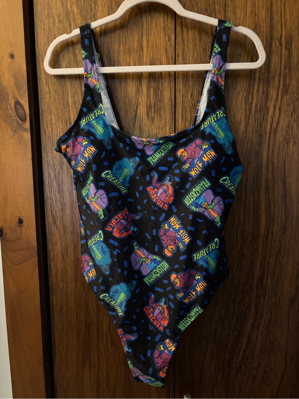 Universal Black One-Piece Swimsuit with Colorful Monster Graphics